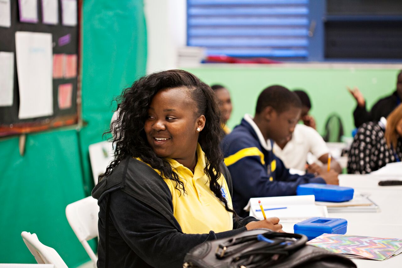 Girl smiling in classroom